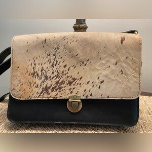 Brand New Charlie Page bag with adjustable strap and inner zipper pocket.